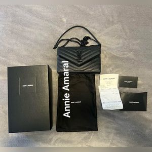 Authentic YSL black wallet on chain genuine leather. Made in Italy
